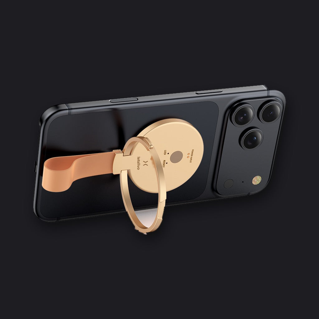 LETSLIVO One on a phone with its Champagne Gold support
